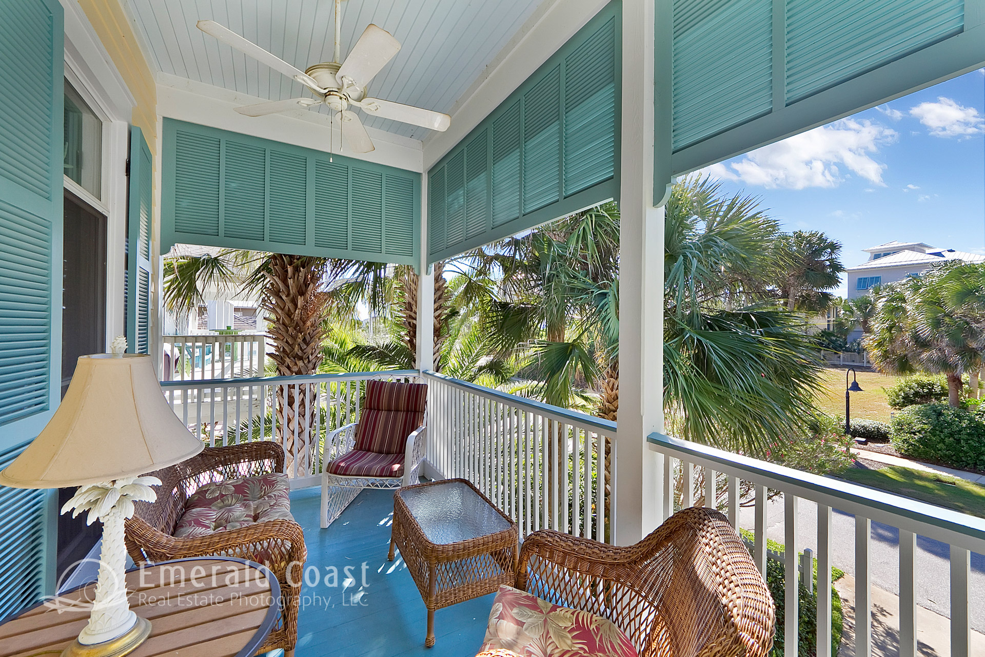 front porch with teal shutters